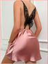 Silk slip dress in rose pink with black lace butterfly back detail and cowl neckline