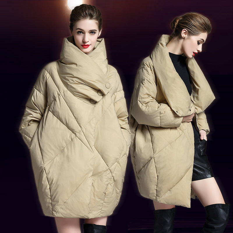 Model showing beige cocoon puffer coat from front and side views, paired with black dress and knee-high boots
