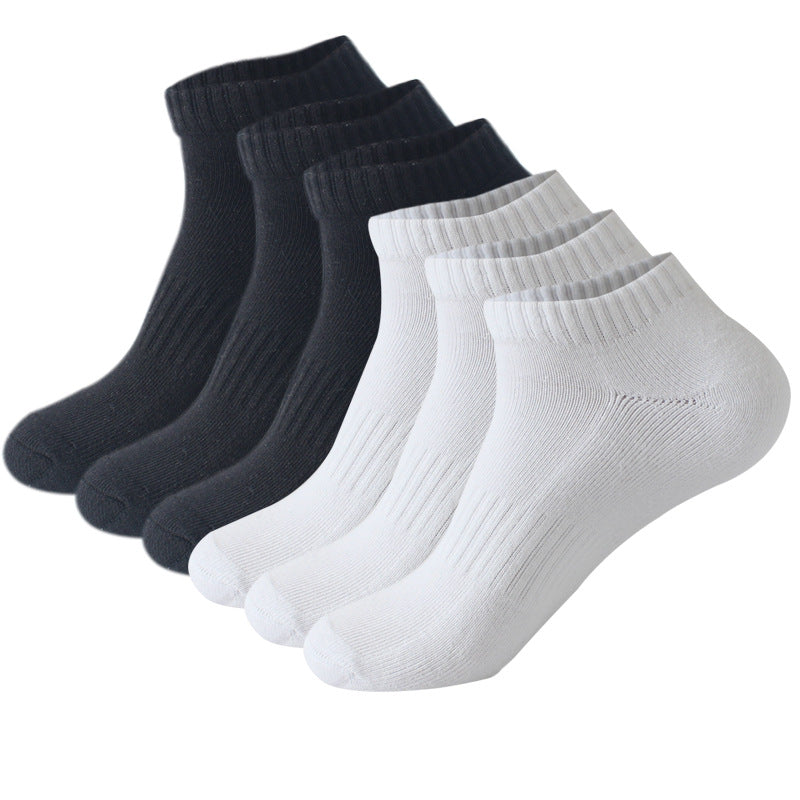 Black and white ankle socks pack – A set of six ribbed ankle socks in black and white, neatly arranged to display the colors and design