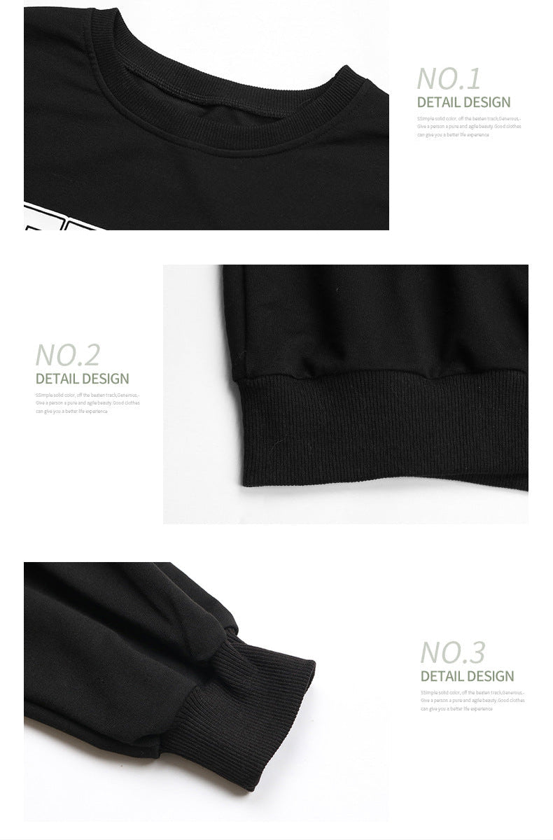 Product details showing ribbed crew neckline and cuffs of black sweatshirt with quality construction highlights