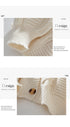 Close-up of ivory knit cardigan button and textured fabric, fashion design details