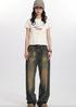 Retro streetwear outfit with striped beanie, graphic puppy tee, wide-leg distressed jeans