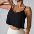 Black cropped camisole with V-neckline and flowy overlay, paired with white bottom
