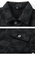 Close-up detail of jacket collar and chest pocket with metal button closure