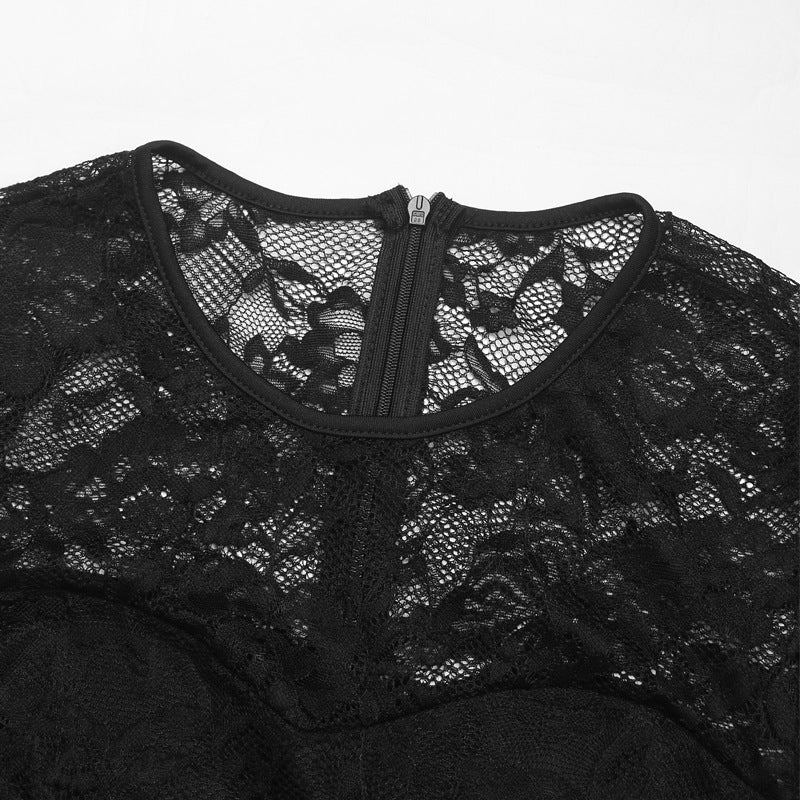 Close-up of a black lace bodysuit's back neckline with a zipper closure.