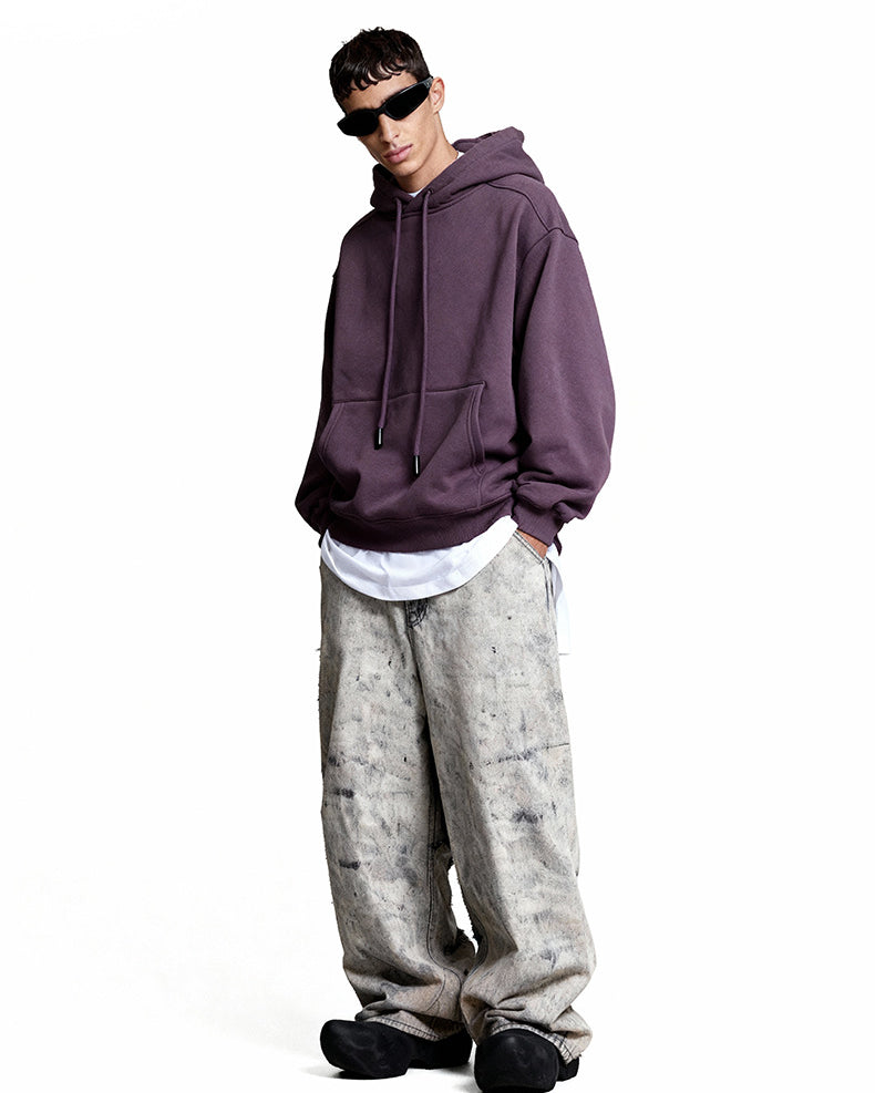 Purple oversized hoodie side view on model, drop shoulder