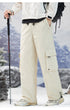 Cream-colored cargo pants with drawstring waist and utility pockets, shown with trekking pole in mountain setting