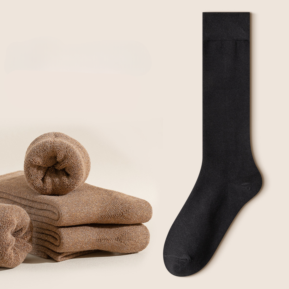Black knee-high sock displayed with folded brown socks and red indicator button