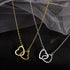 Two delicate heart-shaped pendants on gold and silver chains, displayed on a mesh and textured background