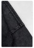 Close-up of sleeve construction showing seam and paneling details