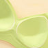 Light green seamless bra with integrated molded cups for stability.