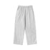 Light gray sweatpants with elastic waist and gathered ankles, showcasing soft fabric texture