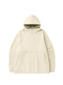 A cream-colored oversized hoodie with raglan sleeves and a front pocket displayed flat against a white background