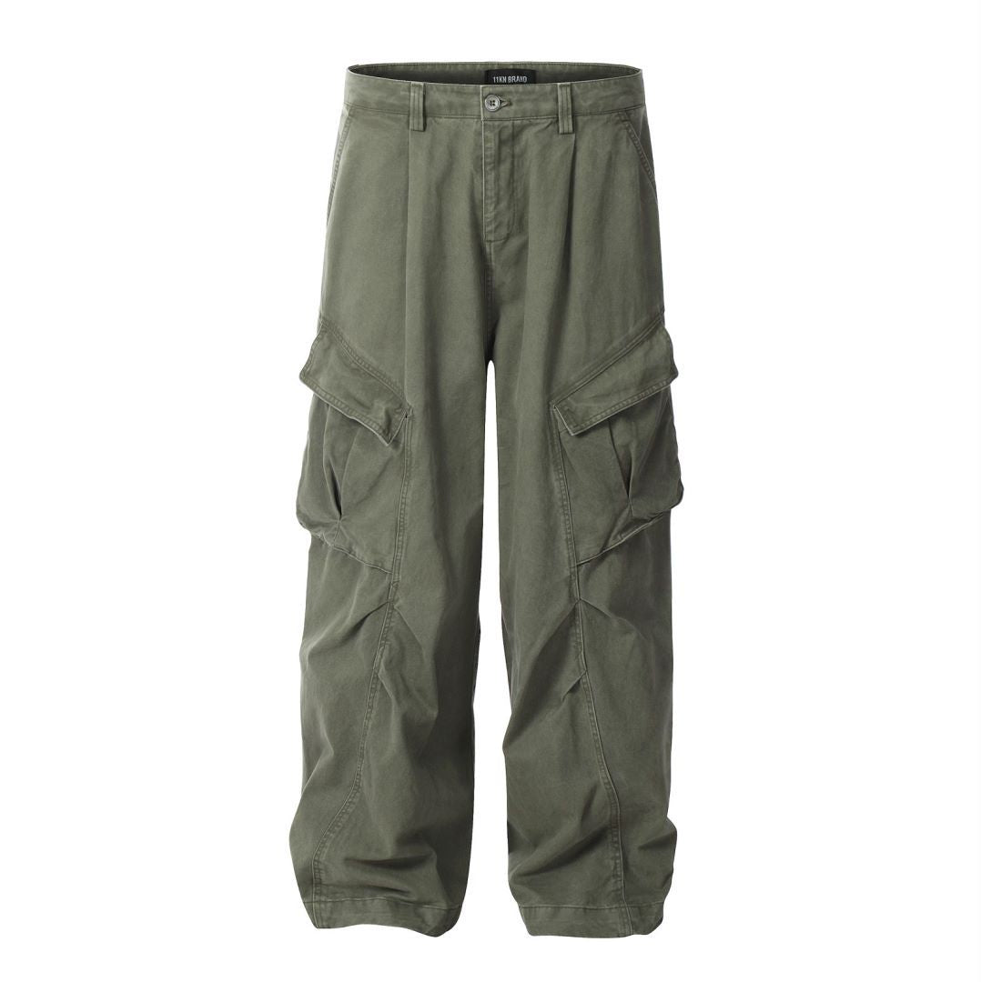 Olive green cargo pants with wide legs, side utility pockets, and pleated front styling displayed on white background