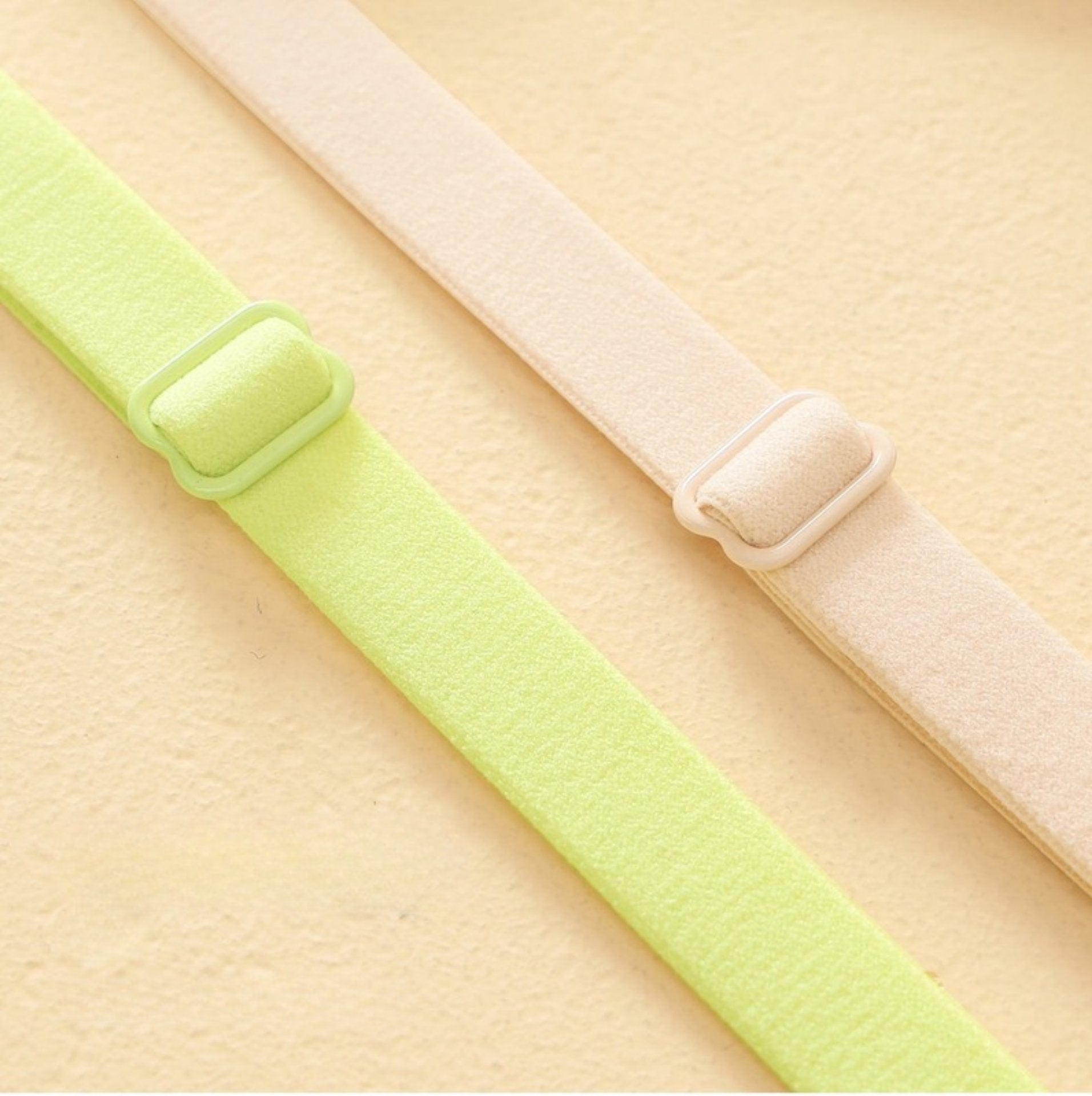 Light green seamless bra with integrated molded cups for stability.