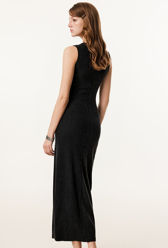 Female model in a black sleeveless bodycon maxi dress, showing the back fit and smooth silhouette.