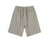 Light gray cotton shorts with elastic shirred waistband and matching drawstring, shown against white background
