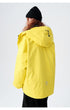 Back view of yellow technical jacket showing hood drawstring detail and brand logo placement