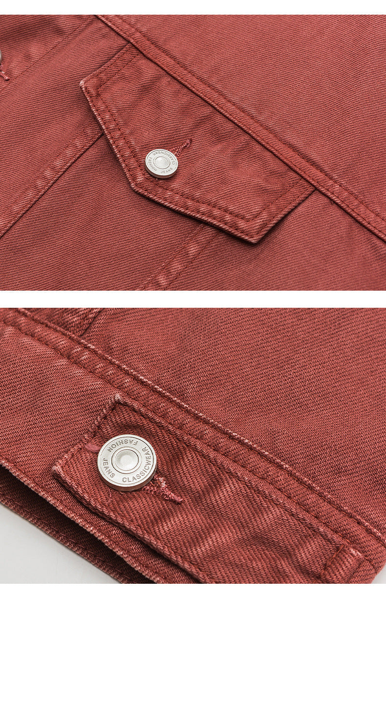Crisp white denim jacket with silver buttons and dual chest pockets displayed flat against white background