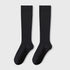 Pair of black knee-high socks displayed flat against light background showing full length and shape