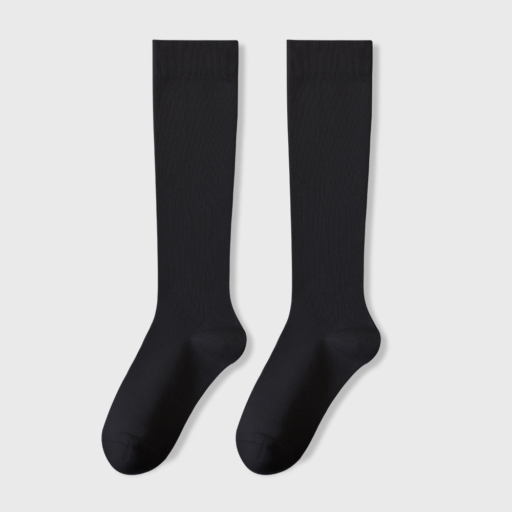Pair of black knee-high socks displayed flat against light background showing full length and shape