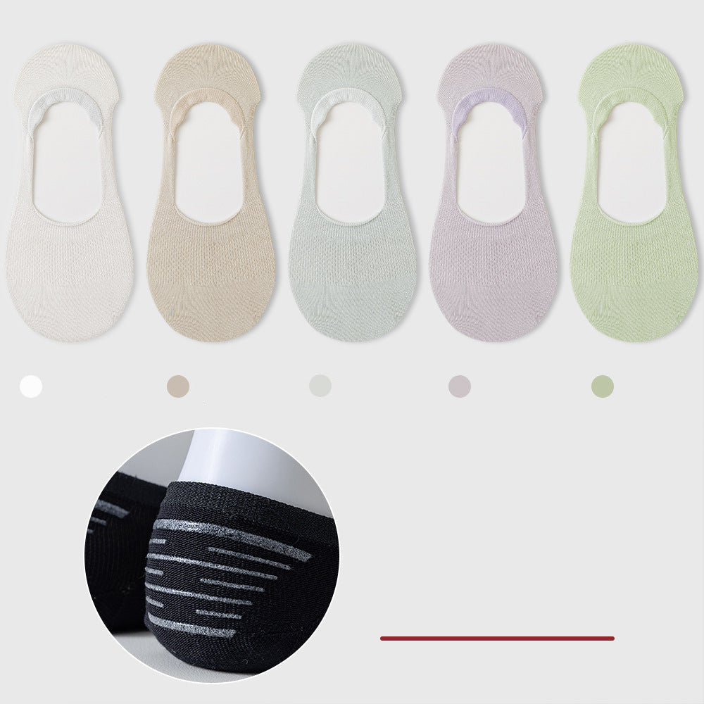 Five no-show socks arranged horizontally: white, cream, gray, mint, lavender, with grip detail photo
