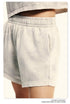 Close-up of light beige cotton shorts with elastic waistband showing side pocket detail