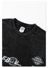 Close-up of black t-shirt neckline showing New Wave Street Culture tag and ribbed collar against white background