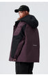 A woman wearing Brooklyn cap shows back view of plum/black All Drifting jacket with hood detail against white background