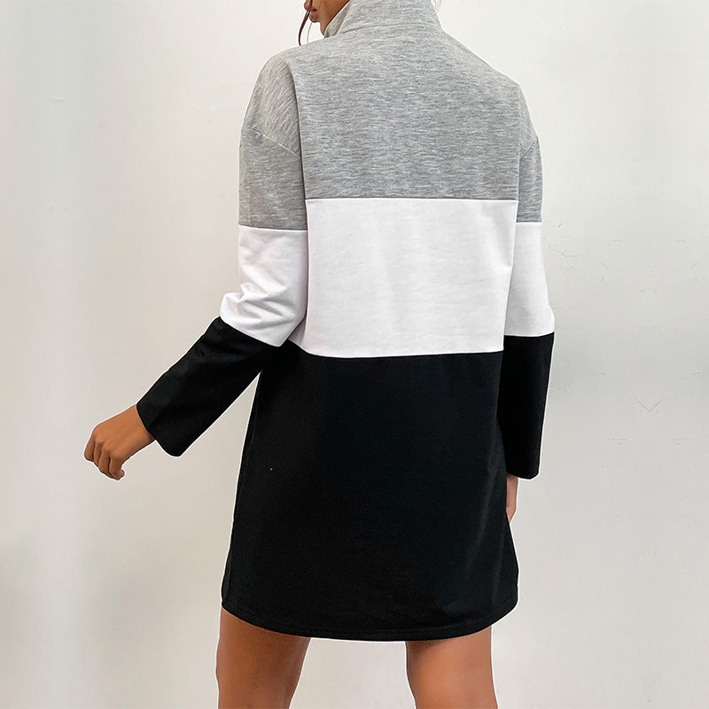 Back view of color-block sweatshirt dress with half-zip detail