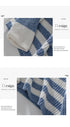 Detail of blue and white striped knit texture and pattern