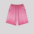 Bright pink washed cotton shorts with drawstring waist and side pockets displayed flat against light gray background