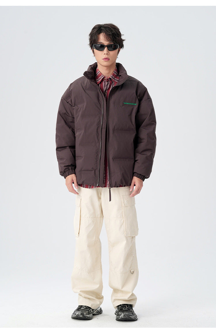 Male model demonstrating brown and black puffer jackets with various styling