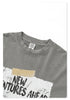 Close-up of gray t-shirt neckline showing 'NEW WAVE CULTURE' brand tag and fabric detail
