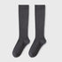 Pair of dark gray knee-high socks displayed against white background showing ribbed texture