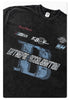 Close-up of black washed t-shirt showing red Backhander script logo and blue B graphic print on front chest area
