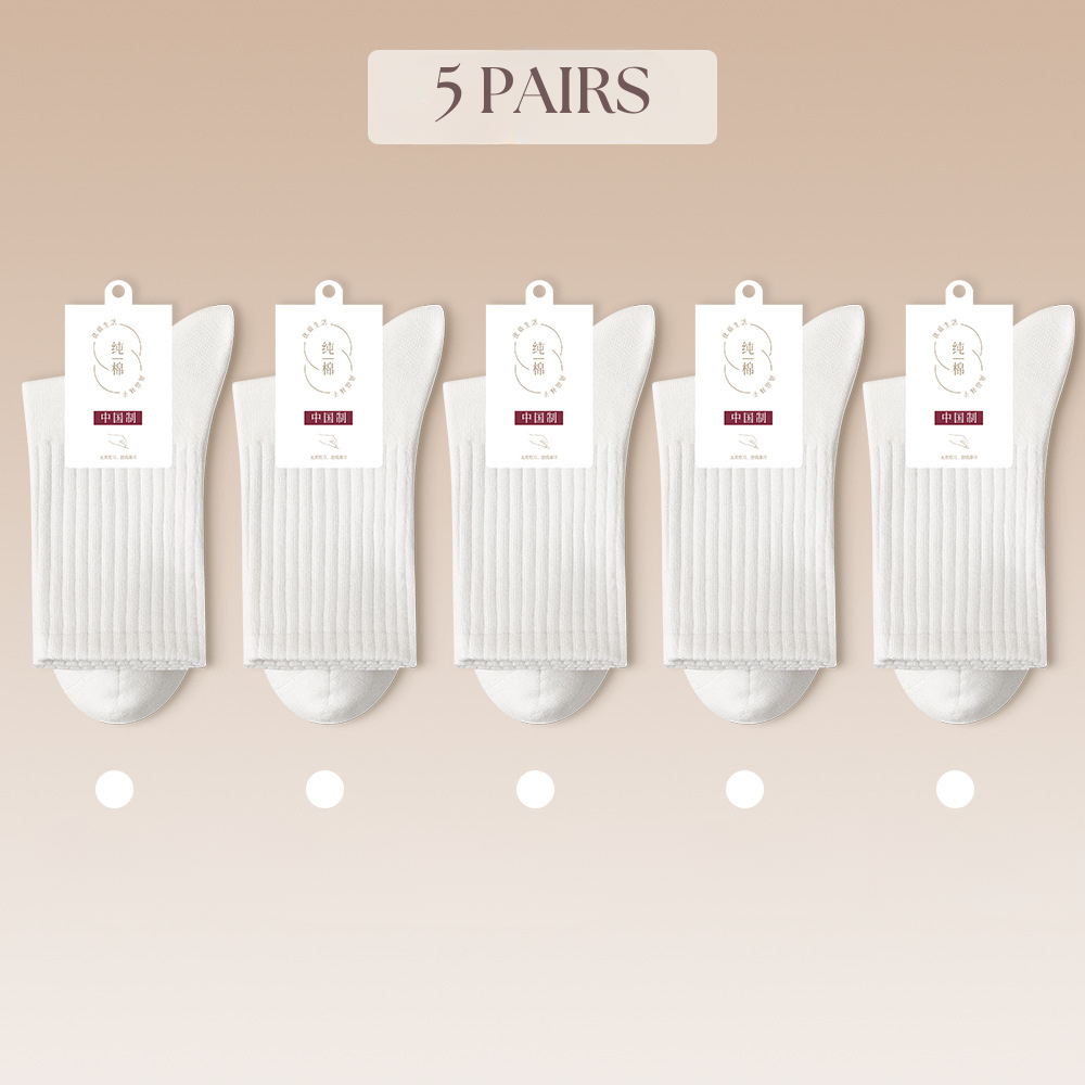 Five pairs of pure white ribbed cotton socks with matching product tags and indicators
