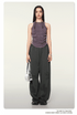 Grape purple tank top styled with wide-leg pants