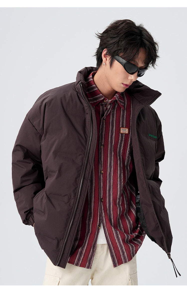 Male model demonstrating brown and black puffer jackets with various styling
