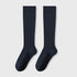 Pair of navy blue knee-high socks with ribbed texture displayed against light background
