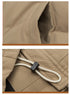 Close-up of tan textured fabric showing pocket detail and drawstring with plastic stopper for adjustable fit