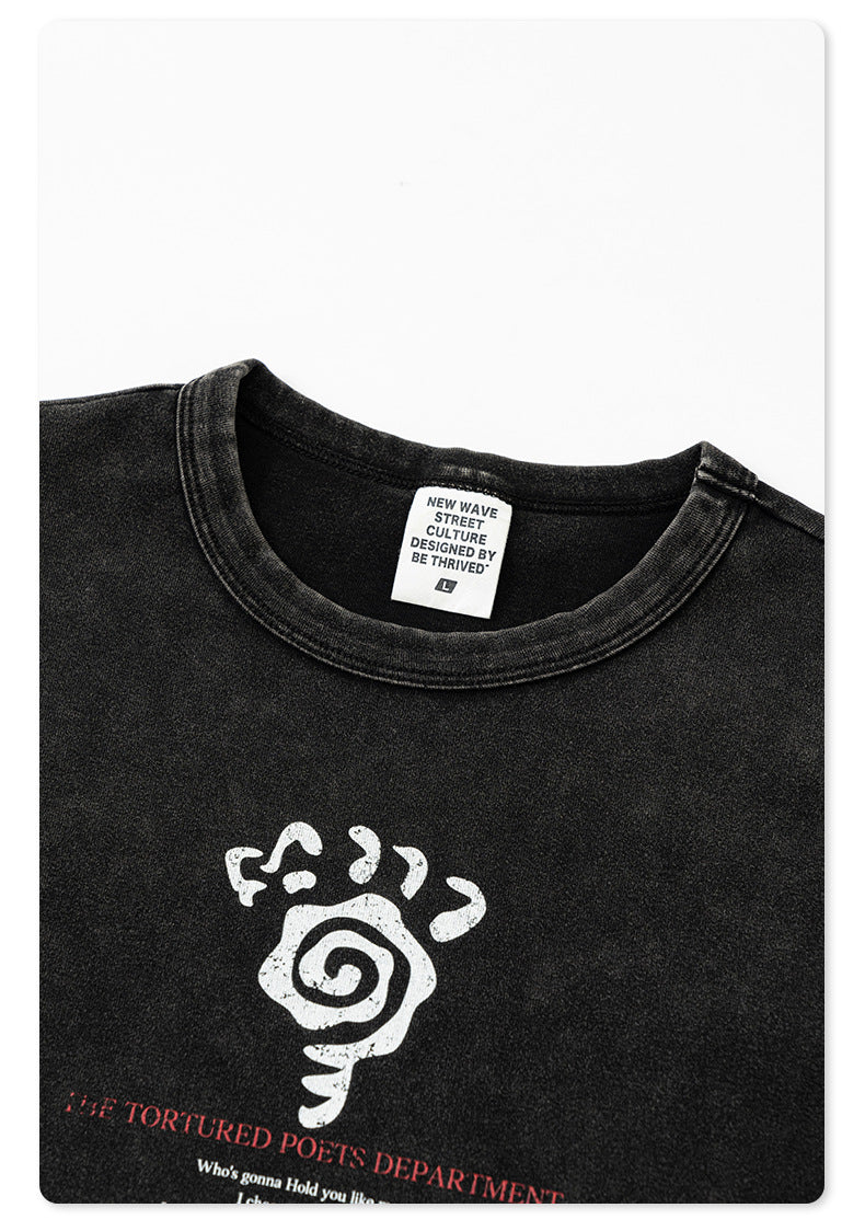 Black washed cropped T-shirt with a ribbed neckline, featuring a printed label reading "New Wave Street Culture Designed by Be Thrived"