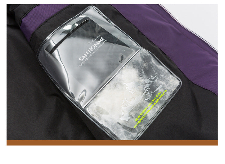 Detail of black vest with transparent pocket containing SanHome brand card, technical design feature in outdoor apparel
