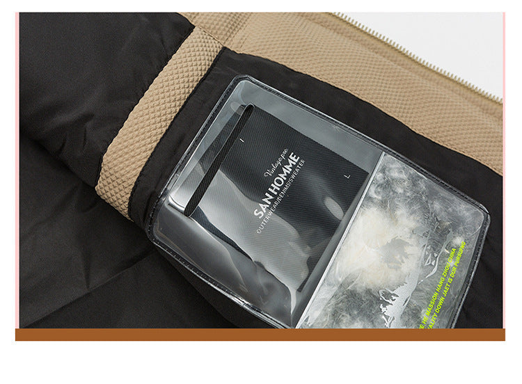 Interior pocket detail showing perfume packaging insert in tan puffer jacket, highlighting functional storage design