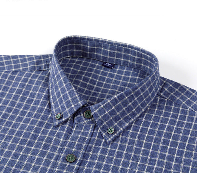 Close-up of blue check shirt collar showing button-down detail and brand label placement