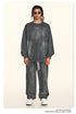 Street style grey sweatsuit with white drawstrings, styled with retro sunglasses and chunky sneakers