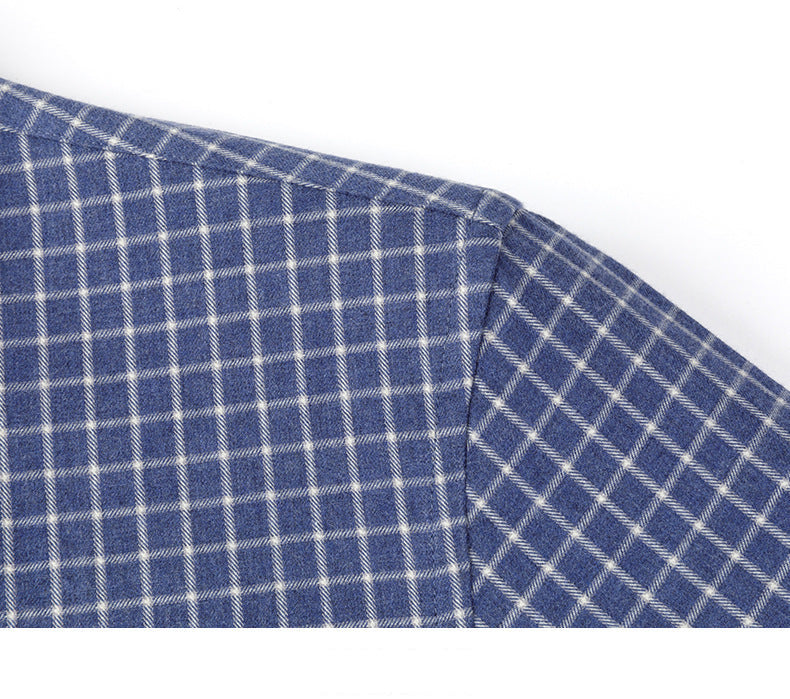 Detailed fabric view of blue check pattern showing material texture and diagonal twill weave