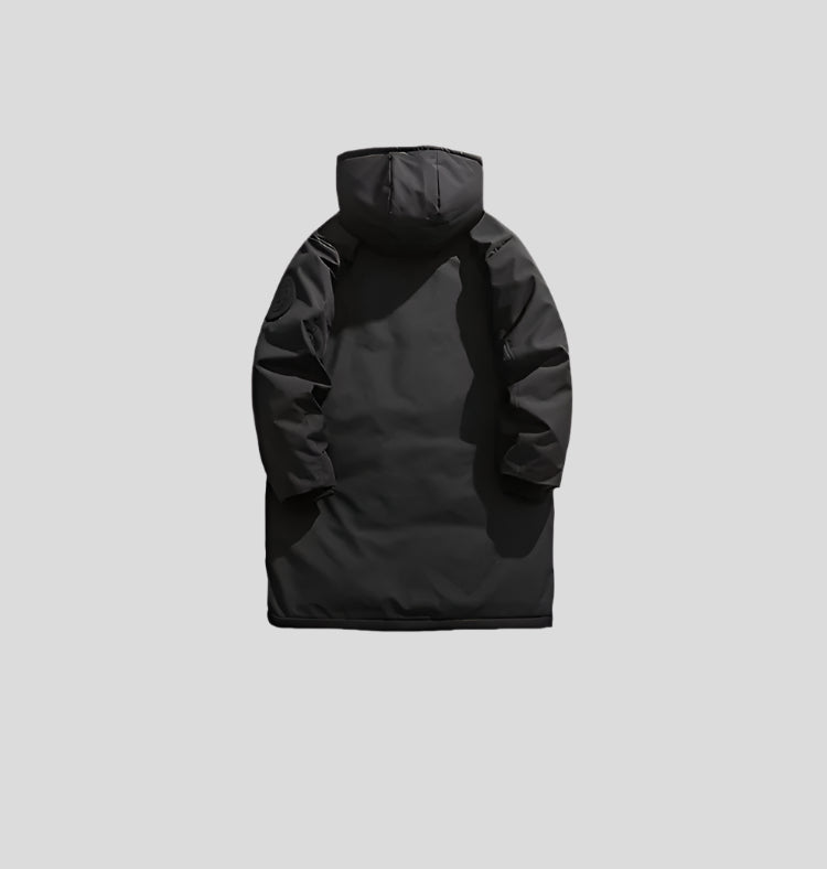 Product view of black NEIGHBORHOOD parka shown from back against light gray background highlighting hood construction
