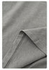 Close-up of fabric texture showing washed effect on gray cotton material