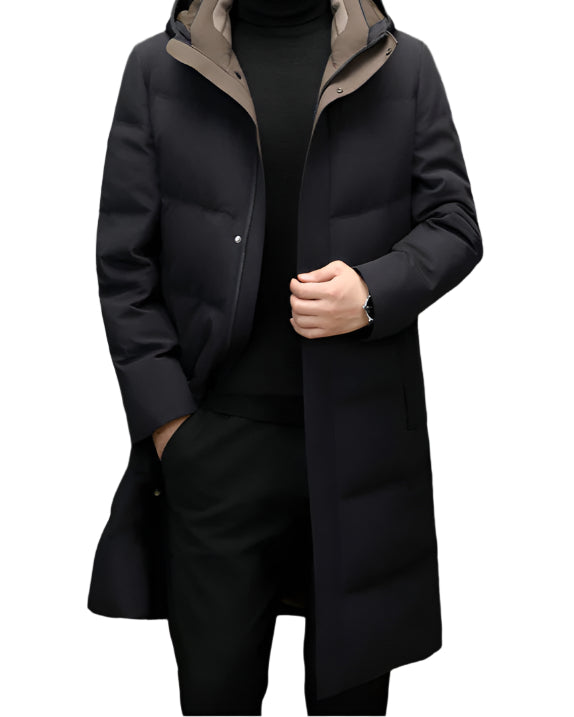 Close-up of a man in a black hooded down coat with a brown inner lining, revealing the coat’s snap buttons and high collar design